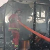 gudang televisi terbakar